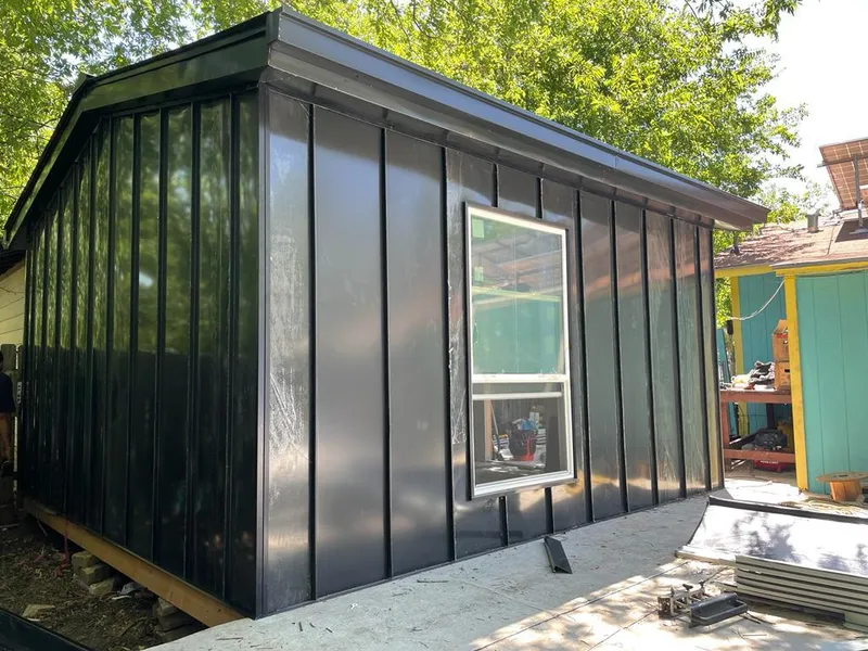 Black standing seam metal wall panels for Metal Roof Installation in Milo